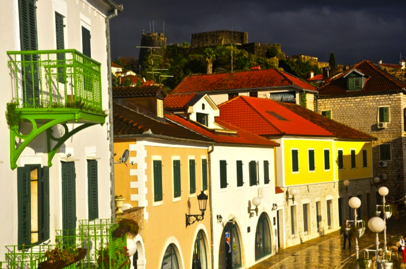 Shopping Street With Castle Behind